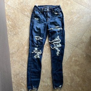 Blue ripped American eagle jeans